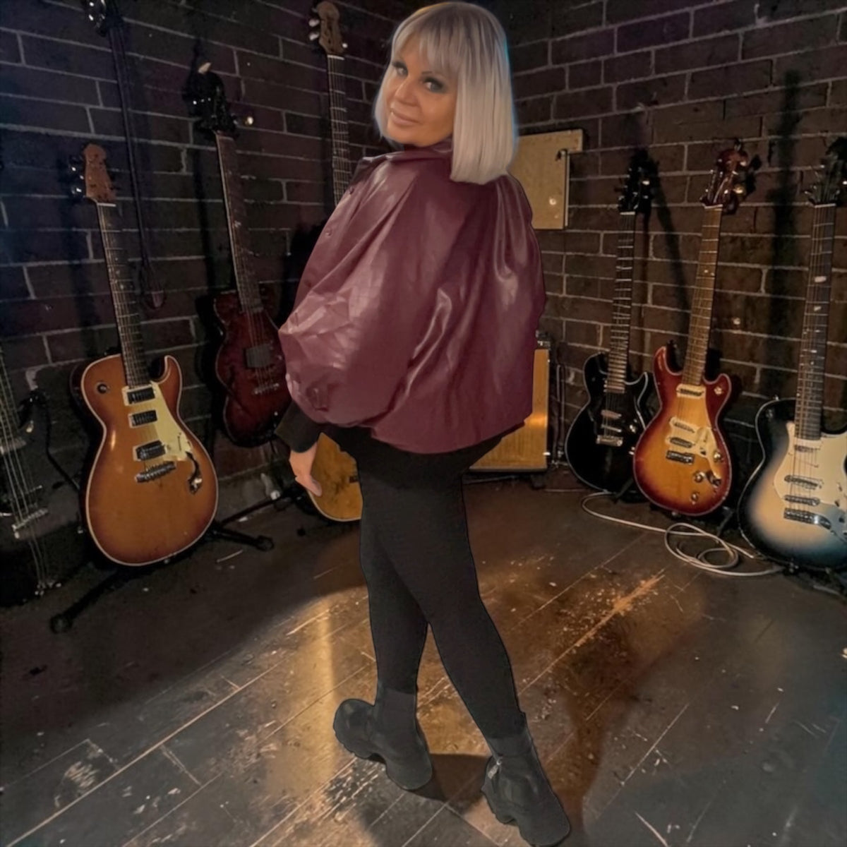 Veste cape oversize en similicuir texturé à manches chauve-souris