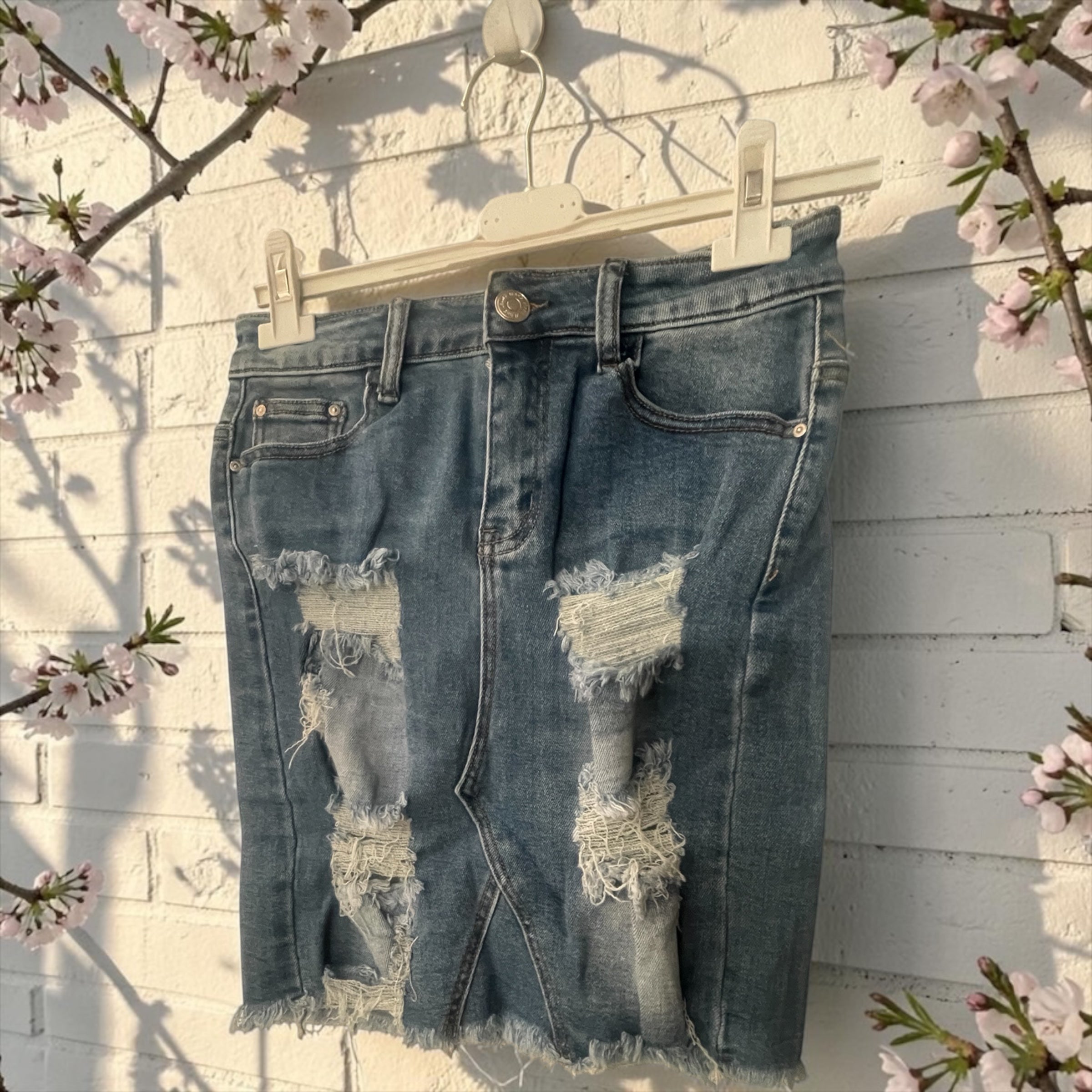 Jupe jeans effet craqué L'autre mode