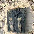 Jupe jeans effet craqué - L'autre mode